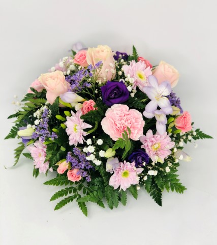 <h2>Lilac and Pink Classic Posy | Funeral Flowers</h2>
<ul>
<li>Approximate Size W 20cm H 30cm</li>
<li>Hand created lilac and pink posy in fresh flowers</li>
<li>To give you the best we may occasionally need to make substitutes</li>
<li>Funeral Flowers will be delivered at least 2 hours before the funeral</li>
<li>For delivery area coverage see below</li>
</ul>
<h2><br />Liverpool Flower Delivery</h2>
<p>We have a wide selection of Funeral Posies offered for Liverpool Flower Delivery. Funeral posies can be provided for you in Liverpool, Merseyside and we can organize Funeral flower deliveries for you nationwide. Funeral Flower can be delivered to the Funeral directors or a house address. They can not be delivered to the crematorium or the church.</p>
<br>
<h2>Flower Delivery Coverage</h2>
<p>Our shop delivers funeral flowers to the following Liverpool postcodes L1 L2 L3 L4 L5 L6 L7 L8 L11 L12 L13 L14 L15 L16 L17 L18 L19 L24 L25 L26 L27 L36 L70 If your order is for an area outside of these we can organise delivery for you through our network of florists. We will ask them to make as close as possible to the image but because of the difference in stock and sundry items, it may not be exact.</p>
<br>
<h2>Liverpool Funeral Flowers | Posies</h2>
<p>This beautiful posy has been loving handcrafted by our florist. A classic selection in lilac and pink including large-headed roses, freesias, lisianthus and spray chrysanthemums presented in a posy design.</p>
<br>
<p>Funeral posies are suitable as funeral flowers and as tribute gifts to the bereaved family. The Funeral posy is flowers arranged in a circular shape. In the case of cremation, the family may like individual posies which can also be used as table decorations at the wake.</p>
<br>
<p>Contents of the Standard Posy:30cm Posy Pad, 3 Pink Roses, 1 Pink Spray Roses, 1 Purple Lisianthus, 3 Lilac Freesia, 3 Pink Carnations, 1 Pink Spray Chrysanthemums, 2 Green Bupleurum and Lilac September Flower with mixed Foliage.</p>
<br>
<h2>Best Florist in Liverpool</h2>
<p>Trust Award-winning Liverpool Florist, Booker Flowers and Gifts, to deliver funeral flowers fitting for the occasion delivered in Liverpool, Merseyside and beyond. Our funeral flowers are handcrafted by our team of professional fully qualified who not only lovingly hand make our designs but hand-deliver them, ensuring all our customers are delighted with their flowers. Booker Flowers and Gifts your local Liverpool Flower shop.</p>
<p><br /><br /><br /></p>
<p><em>Vivian Hart - Review from Facebook - Funeral Flowers Liverpool</em></p>
<br>
<p><em>This 5 Star review was from Facebook - Booker Flowers and Gifts - Reviews Facebook</em></p>
<br>
<p><em>Visited Booker Flowers as my usual florist was closed. Ordered funeral flowers. The advice and customer service we were given was excellent. The flowers exceeded our expectations - will be using Booker Flowers in the future - Thank you</em></p>
<br>